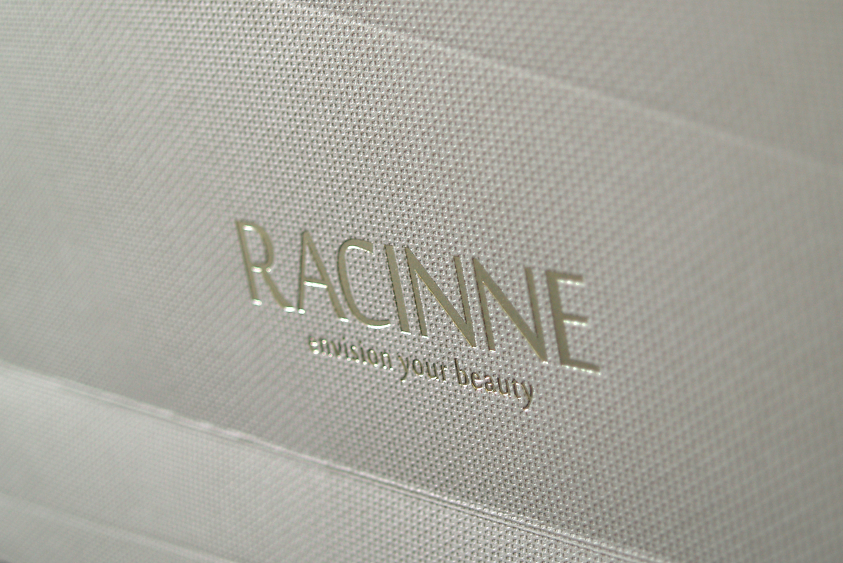 Racinne - bespoke carrier and brochure suite